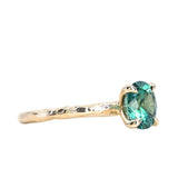 1.51ct Precision Cut Oval Teal Montana Sapphire Evergreen Carved Solitaire in 14k Yellow Gold