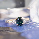1.35ct Nigerian Deep Teal Oval Sapphire and Lab Diamond Three Stone Ring in 14K Yellow Gold