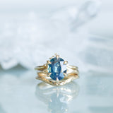 4.07ct Oval Deep Teal Sapphire Low Profile Six Prong Split Shank Solitaire in 14k Yellow Gold