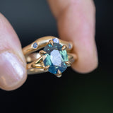 4.07ct Oval Deep Teal Sapphire Low Profile Six Prong Split Shank Solitaire in 14k Yellow Gold