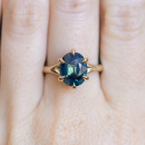 4.07ct Oval Deep Teal Sapphire Low Profile Six Prong Split Shank Solitaire in 14k Yellow Gold
