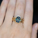 4.07ct Oval Deep Teal Sapphire Low Profile Six Prong Split Shank Solitaire in 14k Yellow Gold