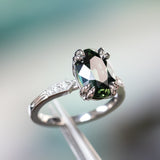 4.26ct Oval Deep Teal Madagascar Sapphire Double Claw Prong Low Profile Milgrain and Diamond Ring in Platinum