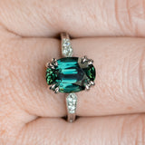 4.26ct Oval Deep Teal Madagascar Sapphire Double Claw Prong Low Profile Milgrain and Diamond Ring in Platinum