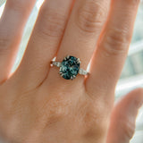 3.94ct Oval Unheated Deep Teal Blue Australian Sapphire Double Claw Prong Low Profile Milgrain and Diamond Ring in Platinum