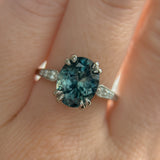 3.94ct Oval Unheated Deep Teal Blue Australian Sapphire Double Claw Prong Low Profile Milgrain and Diamond Ring in Platinum