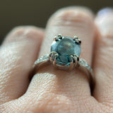 3.94ct Oval Unheated Deep Teal Blue Australian Sapphire Double Claw Prong Low Profile Milgrain and Diamond Ring in Platinum