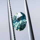 0.91CT OVAL PRECISION CUT AUSTRALIAN SAPPHIRE, AQUA PARTI TEAL, 6.37X4.79MM, UNHEATED