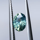 0.91CT OVAL PRECISION CUT AUSTRALIAN SAPPHIRE, AQUA PARTI TEAL, 6.37X4.79MM, UNHEATED