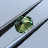 1.34CT PRECISION CUT ROUND BRILLIANT MADAGASCAR SAPPHIRE, EMERALD GREEN, 6.49X4.36MM