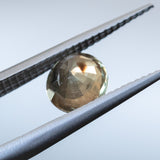 1.50CT ROUND MADAGASCAR SAPPHIRE, BROWN WITH ORANGE AND GREEN FLASHES, 6.7MM