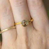 1.50CT ROUND MADAGASCAR SAPPHIRE, BROWN WITH ORANGE AND GREEN FLASHES, 6.7MM