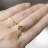 1.50CT ROUND MADAGASCAR SAPPHIRE, BROWN WITH ORANGE AND GREEN FLASHES, 6.7MM