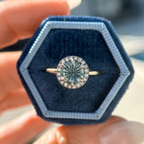 1.81ct Round Fantasy Carved Untreated Montana Sapphire and Antiqued Diamond Halo ring in 14k Yellow Gold