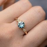 1.31ct Round Teal Blue Montana Sapphire and Diamond Starry Night Low Profile Solitaire in 14k Yellow Gold