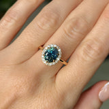 2.35ct Oval Parti Blue Untreated Nigerian Sapphire Antique-Style Diamond Halo Ring in 14k Yellow Gold