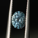 0.84CT FANCY OVAL PRECISION CUT MONTANA SAPPHIRE, SILVERY BLUE, 6.01X3.88MM