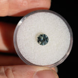 0.98CT PRECISION CUT ROUND MONTANA SAPPHIRE, SILVERY BLUE, 5.75X3.91MM