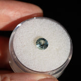 0.98CT PRECISION CUT ROUND MONTANA SAPPHIRE, SILVERY BLUE, 5.75X3.91MM