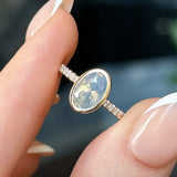 2.01ct Untreated Opalescent Oval Sapphire Low Profile Bezel Solitaire Ring with Pavé Set Diamonds in 14k Yellow Gold