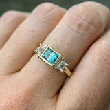 1.06ct Unheated Step Cut Teal Bezel Set Sapphire and White Cadillac Prong Set Sapphire Low Profile Three Stone Ring in 14k Yellow Gold