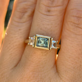 1.06ct Unheated Step Cut Teal Bezel Set Sapphire and White Cadillac Prong Set Sapphire Low Profile Three Stone Ring in 14k Yellow Gold