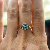 1.46ct Oval Precision Cut Montana Sapphire Low Profile Six Prong Split Shank Solitaire in 14k Yellow Gold