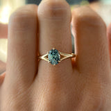 1.46ct Oval Precision Cut Montana Sapphire Low Profile Six Prong Split Shank Solitaire in 14k Yellow Gold