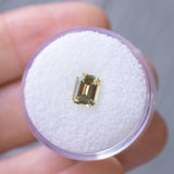 40% OFF 1.25CT EMERALD CUT AUSTRALIAN SAPPHIRE, LIGHT YELLOW-GREEN, 7.0X5.5MM, UNTREATED