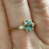 1.20ct Oval Brilliant Teal Montana Sapphire and Princess Cut Diamond Rapids Low Profile Ring in 14k Yellow Gold