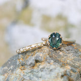 2.48ct Oval Teal Madagascar Sapphire Scallop Cup Solitaire in 14k Yellow Gold