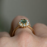 0.97ct Oval Teal Montana Sapphire Low Profile Diamond and Pearl Halo Ring in 14k Yellow Gold