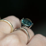 7.19CT OVAL MADAGASCAR SAPPHIRE, LIGHT-MEDIUM TEAL BLUE GREEN, 12.10X9.73X7.55MM - APPRAISED STONE