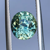 3.03CT OVAL MADAGASCAR SAPPHIRE, PARTI TEAL GREEN YELLOW, 8.09X7.33X6.30MM, UNTREATED