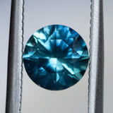1.44CT ROUND PRECISION CUT MONTANA SAPPHIRE, BLUE, 6.85X4.40MM