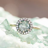 1.81ct Round Fantasy Carved Untreated Montana Sapphire and Antiqued Diamond Halo ring in 14k Yellow Gold