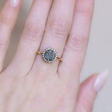 1.81ct Round Fantasy Carved Untreated Montana Sapphire and Antiqued Diamond Halo ring in 14k Yellow Gold