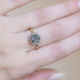 1.81ct Round Fantasy Carved Untreated Montana Sapphire and Antiqued Diamond Halo ring in 14k Yellow Gold