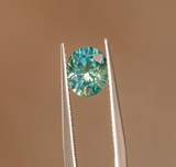 1.94ct Precision Cut Teal Oval Montana Sapphire Lotus Six Prong Solitaire with Diamonds in 14k Yellow Gold