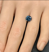 2.49CT PRECISION CUT ROUND BRILLIANT MONTANA SAPPHIRE, MIDNIGHT BLUE, 8.1MM