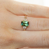 1.16ct Teal Green Radiant Cut Montana Sapphire and Trillion Diamond Low Profile Three Stone ring in 14k Yellow Gold