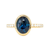 2.53ct Oval Blue Nigerian Sapphire Low Profile Bezel with French Set Diamonds 18k Yellow