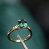 1.80ct Oval Nigerian Parti Sapphire Vintage Cathedral Ring in 14k Yellow Gold in tweezers