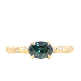 0.85ct Oval Sapphire in 14k Yellow Gold Evergreen Solitaire with Scattered Embedded Diamonds