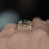 2.04ct Australian Teal Sapphire and Asymmetrical Diamond Cluster Ring in 14k Yellow and 14k White Gold on hand