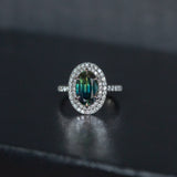 2.72ct Oval Australian Parti Sapphire and Double Diamond Halo in Platinum