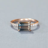 2.56ct Bicolor Sapphire Ombre East West 4-Prong Ring with white and salt & pepper side diamonds in 14k rose gold on table