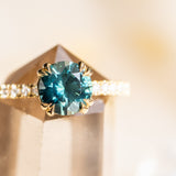 1.44ct Round Nigerian Sapphire Double Claw Prong Solitaire with French Diamonds in 18k Yellow Gold