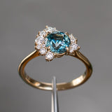 1.73ct Round Madagascar Teal Sapphire and Asymmetrical Diamond Cluster Ring in 14k Yellow Gold