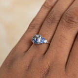 2.02ct Emerald Cut Bicolor Sapphire and Blue Sapphire Side Stone Cluster Ring in Two Tone 14k Yellow and White Gold
